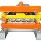 Roll forming machine producing roofing deck plate