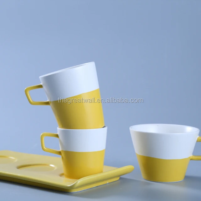 white and yellow ceramic mug with rectangular tray/dish, cups