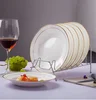Super white porcelain service plates,white ceramic flat dishes with gold rim.
