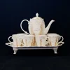 Hot - selling goods bone china embossed gold tea set