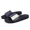 /product-detail/home-flat-rubber-slippers-comfortable-men-s-slides-sandals-wholesale-custom-logo-black-slippers-62209006206.html