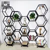 /product-detail/small-wall-bookshelf-mini-book-hexagon-shelf-independent-assortment-wrought-iron-bookcases-shelving-60839210600.html