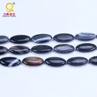 Oval flat black semi precious stone striped agate beads strand