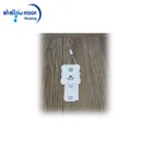 Custom Shanghai transparent plastic pvc patch paper garment accessory label hang tags for clothing