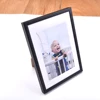 /product-detail/wholesale-matt-black-solid-wooden-custom-size-wall-art-kid-photo-picture-frame-with-sheet-62207990810.html