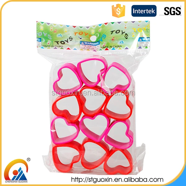 hot selling heart shape rainbow ring spring magic slinky toy