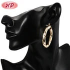 Wholesale Women Fashion Fancy Design Gold Twisted Hoop Earrings
