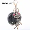 Hot sale in America Cartoon animal key chain with crystal Faux rabbit fur key chain with logo wholesale luxury car keychain