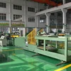 Step lap core cutting machine for transformer magnetic circuits
