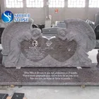 granite headstone monument with angel engraving