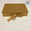 /product-detail/luxuury-customized-logo-magnetic-special-gold-paper-garment-packaging-box-with-ribbon-60747854140.html