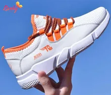 Stock men and female casual sports shoes PU upper PVC sole material running shoes for lovers small MOQ