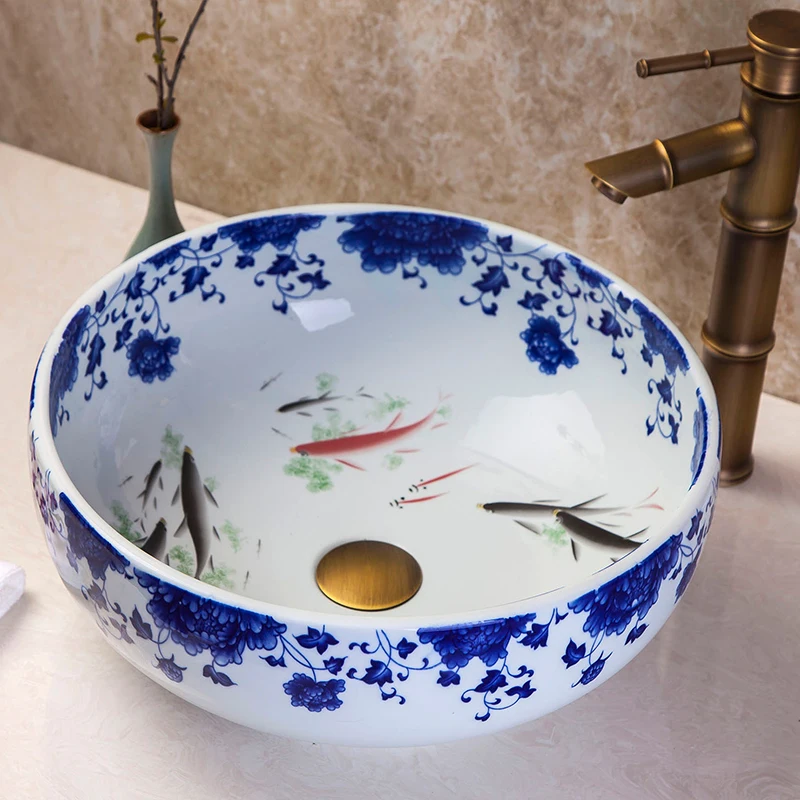 Round fish pattern ceramic art wash basin bathroom blue and white color painted basin cheap sink price