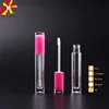 pink color lip gloss tube with applicator