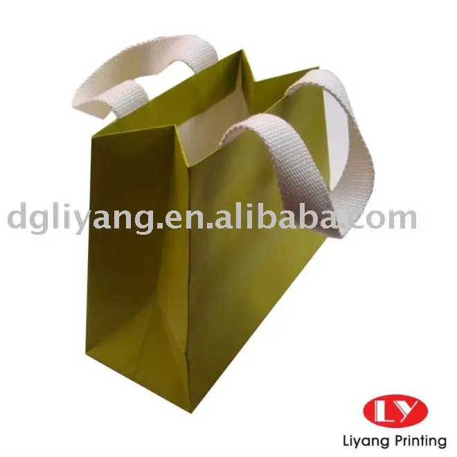 lovely small green printed paper gift bag with strong flat