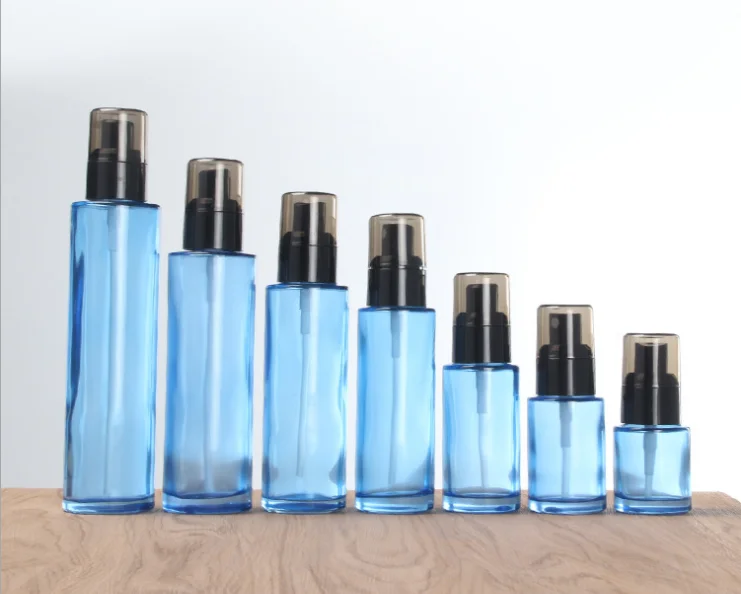 Wholesale 30ml 50ml 100ml transparent blue color Cosmetic packing bottle set bottle cream container for luxury skin care