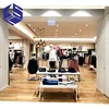 Custom fashion design female clothing stores/clothing shop metal round clothes display rack