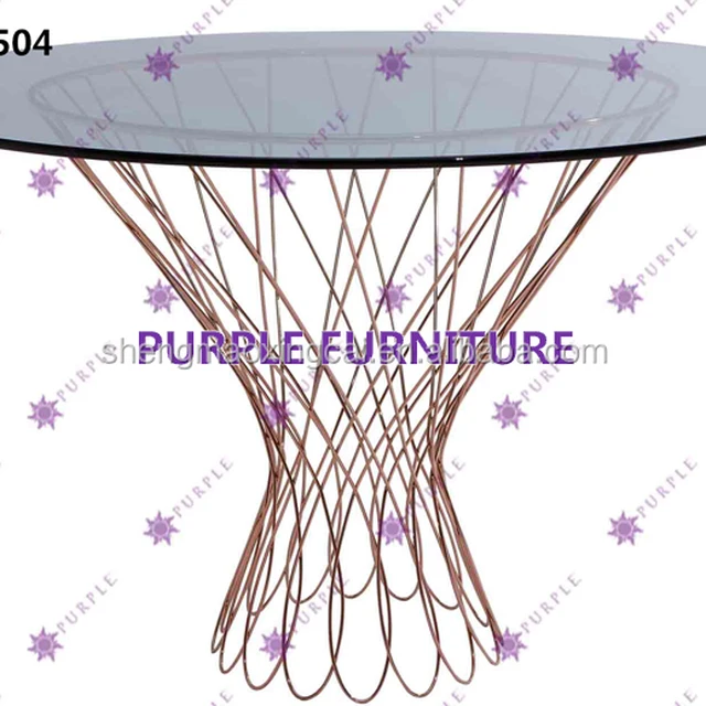 Stainless steel dining room table with tempered glass top