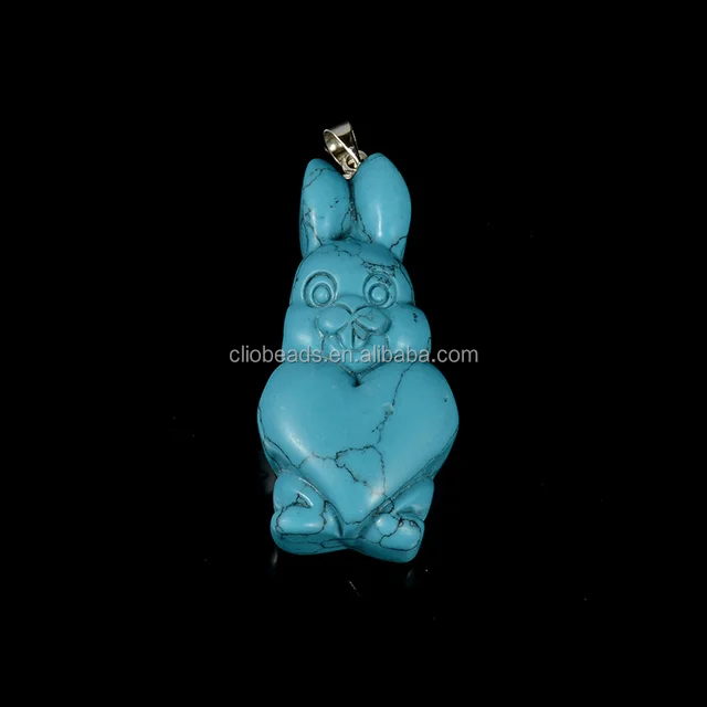 carved stone animals jewelry, blue turquoise and opal carton