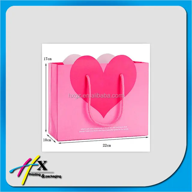 heart shape paper gift bag with pink cotton handles
