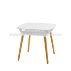 white color MDF top with wood leg dining table
