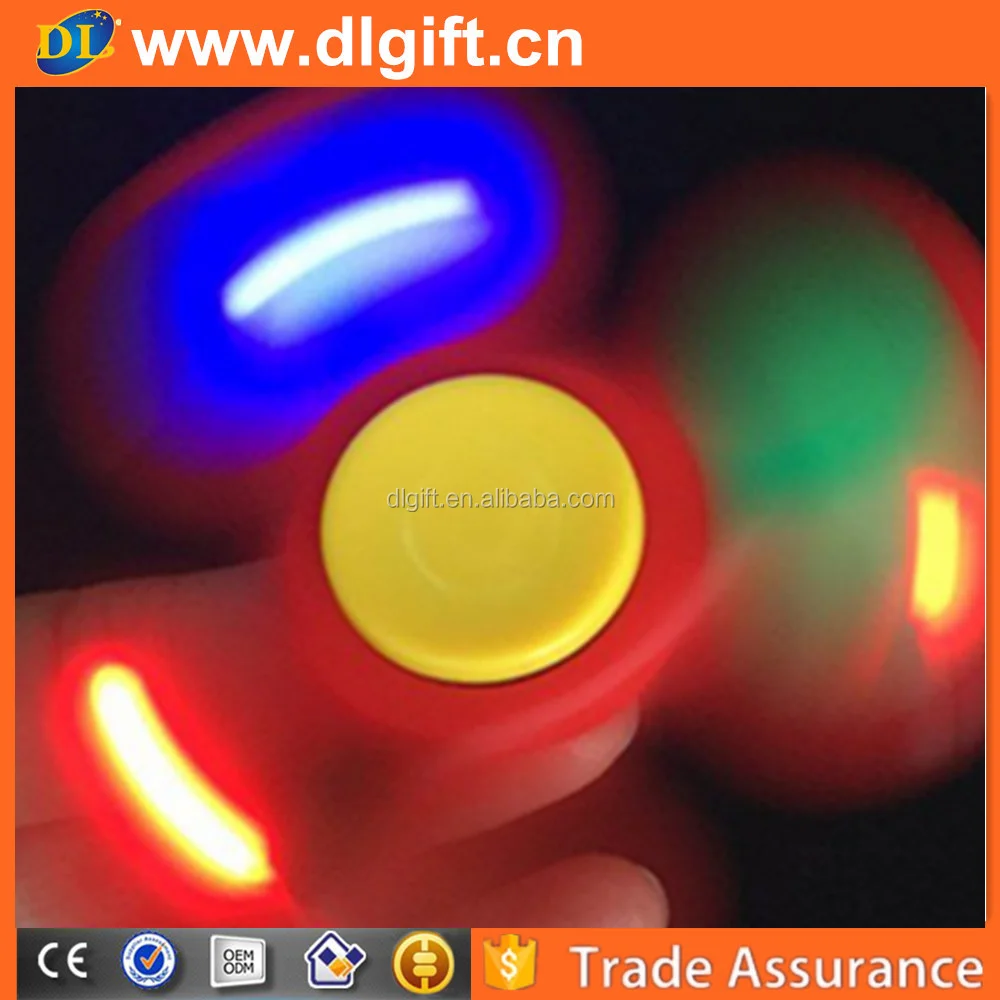 England best selling cheap plastic led light spinner toy for adult