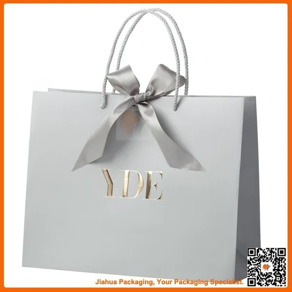 elegant silvery paper gift bag with tiebow