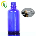 gold dropper cap blue glass bottle for skin Argan oil