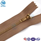 DAWEI brand zipper manufacturer close-end shining gold brass teeth golden metal zipper