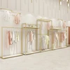 Modern Lady Clothes Store Interior Design Metal Gold Garment Rack For Showroom Retail Wall Mounted Clothing Shops Display Stands
