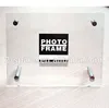 recycled paper photo frame back standing on desk by bolt