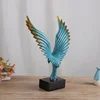 /product-detail/wholesale-european-creative-living-room-resin-eagle-wings-flying-crafts-ornaments-for-home-decoration-62167543791.html