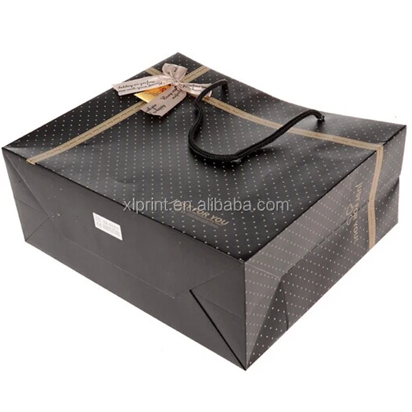 elegant gift paper bag with bow tie ribbon