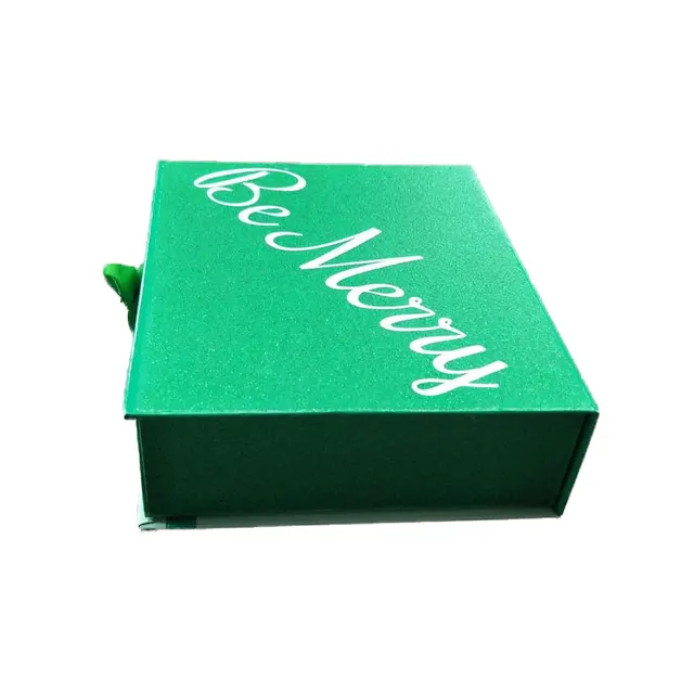 empty green box with ribbon for gift packaging luxury