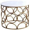 round stone marble top coffee table besides sofa