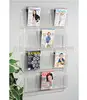 /product-detail/custom-wall-hanging-acrylic-magazine-rack-display-shelf-537747462.html