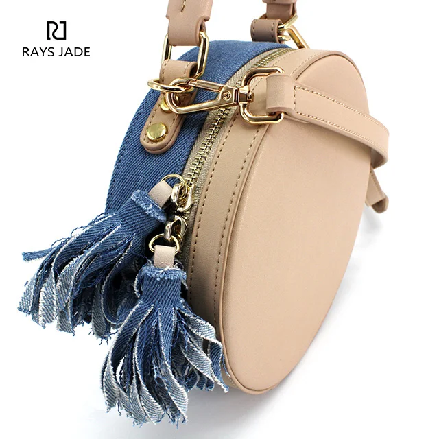 Designer cross-body bag made in denim with plain leather ladies handbags