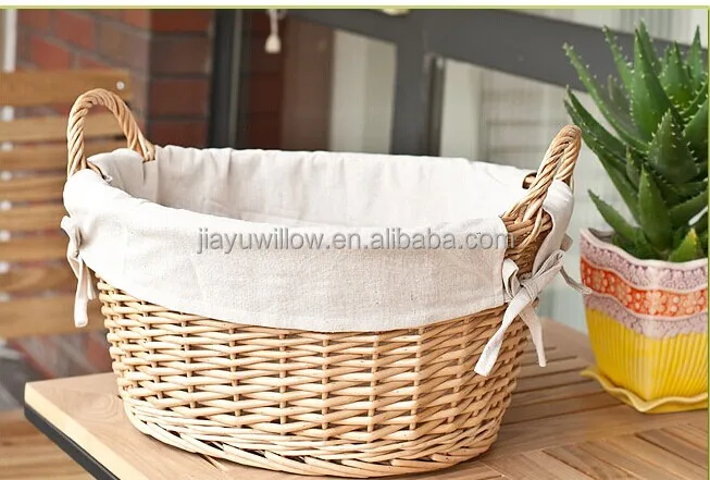 handmade and natural wicker storage basket with wheels carrying