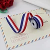 /product-detail/wholesale-red-white-blue-fabric-woven-american-flag-ribbon-60629402188.html