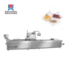 Automatic Thermoforming Continuous Stretch Film Vacuum Packaging Machine