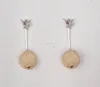 Alloy drop earring with woven ball and star stud