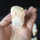 Wholesale natural quartz hand carved crystal skull with white cluster hair for sale