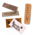 Custom made leather labels for garment From China supplier