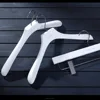 New wholesale cheap white solid wooden clothes hanger with logo