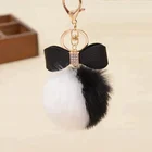 Custom high quality leather flower with fur ball keychain colorful rabbit pompom keychains key chain with pu bow knot