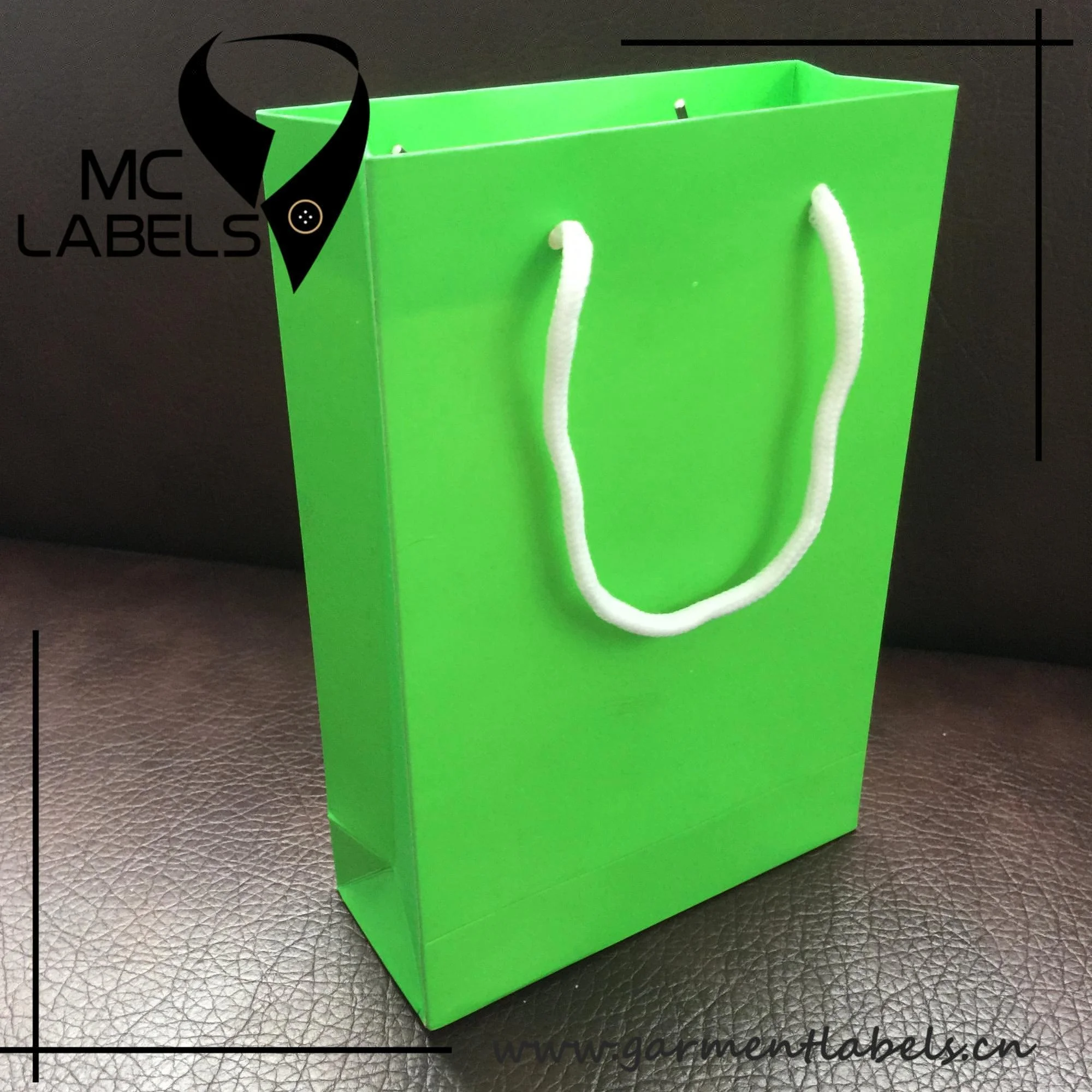 gift bags with green handles