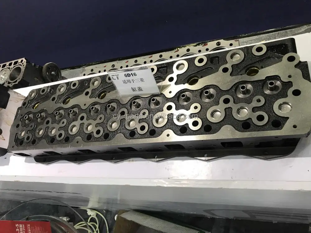6D16 CYLINDER HEAD ..