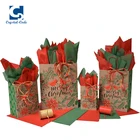 Christmas promotional plastic coated kraft paper gift bags in bulk