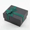 Promotional different shape grey paper gift box with green ribbon