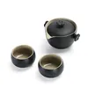 Black pottery stone glazed tea set with one pot and two cups of portable travel tea set